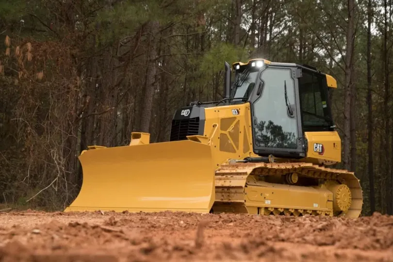 Heavy equipment performing land clearing and site preparation